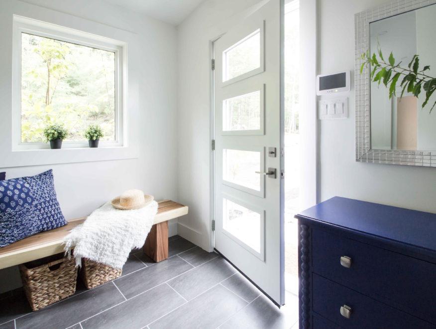 Installed entry door and window in a Winnipeg home